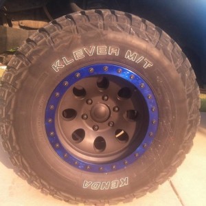 blue and black plastidiped wheels