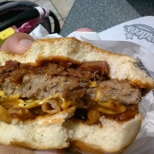Deep fried onions and jalapenos, BBQ brisket, cheese and 1/3 party on a fre