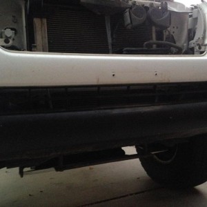 Anyone know how to remove that plastic piece in the valance of the bumper? 