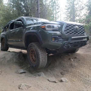 Army-green-tacoma-crawling