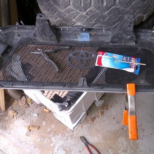 Too many rough miles took its toll on my Homer grill. Epoxy and tie wraps m