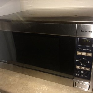 A new, undamaged, microwave showed up. This one has a nicer interface and h