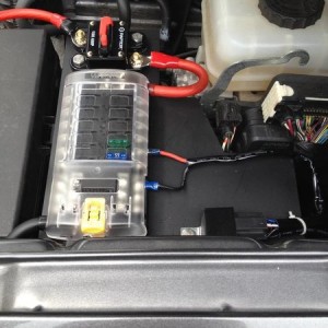 Fuse box, bracket and plate