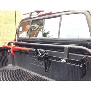 Hi-lift mounted on custom bed bar