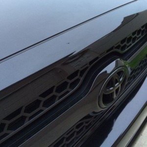 Yes, it's that tiny little scratch right in the center top part of the