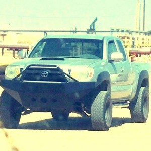 05 4x4 TRD Tacoma with winch bumper sitting on 31" wheels