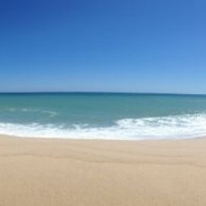 Mid-day Saturday in Cabo standing on the beach in front of a 5-Star resort 