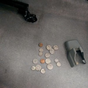 $2.22 sitting under that cover behind the driver's seat.