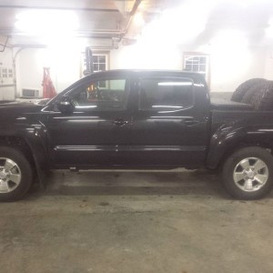 700# in bed on a 2 week old truck and damn near on bump stops...