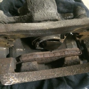 Drove 400 miles on a stuck caliper. Had to. This is the result.