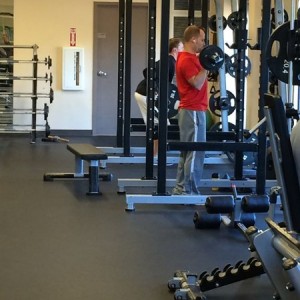 Asshole doing curls in the squat rack!