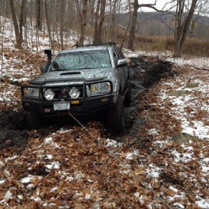 Winching! Rear is hung up on a rock!