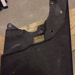 Trimming up my mud flaps... Had to take even more off. Notice the scuff to 