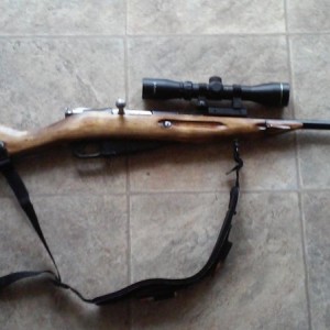 Mosin officially sporterized. $250 gun and parts and a couple hours tinkeri