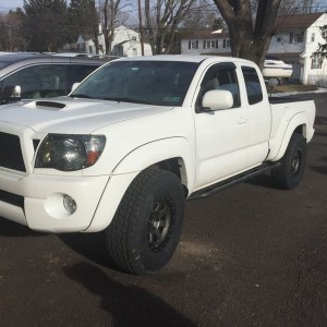 285 nitto Terra's on stock TRD sport suspension. :cool: