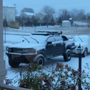 About 1" so far, supposed to get 8-12" by the morning