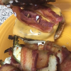 Home made burger topped with bacon wrapped jalape