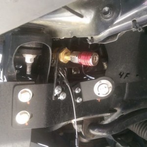 Rock light attached to the inner front bumper