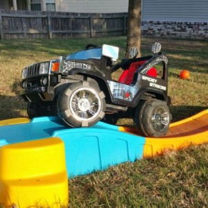 Checking out the flex on the kiddos new ride
