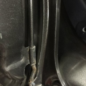 This happen to anyone else's fuel door? Spring broke