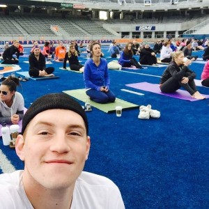 Yoga session on the blue turf at bsu!