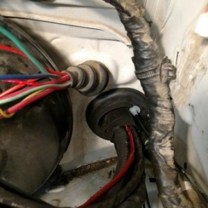 Buttoned back up with all the new harnesses.