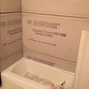 Got the tub back in and made some progress on cement board.