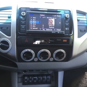 Like a glove. 2012 radio bezel and 4WD switch in a 2009