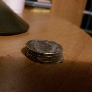 Walgreen's was out of $1 bills, so they had 4 quarters taped together instead...