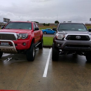 Mines on the right. Not sure who sat higher. He's got Pro Crap lift mines a Fabtech. Like the grill, hate that bull bar!