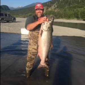 My fishing/hunting partner Randy with the biggest King we caught.