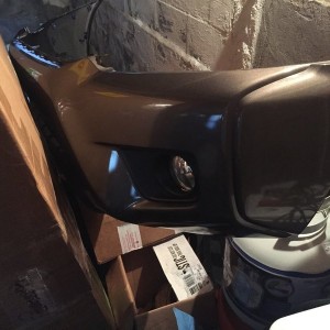 2012 front end coming together. Not seen in pic: hood (in box) and color matched grill