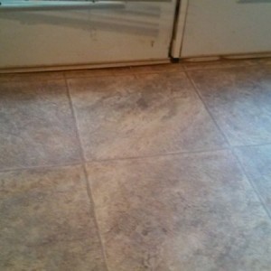 Tape down linoleum ftw pulled it back did the repair now just gotta get some flooring tape to put it back after a good vacuum