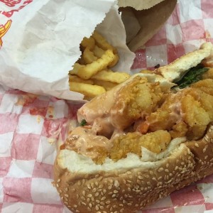 Shrimp po boy and a sack of fires