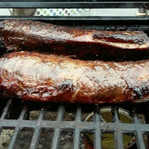 About 2.5 hours over some pecan. Brushed with butter and garlic olive oil half way thru and they smell amazing