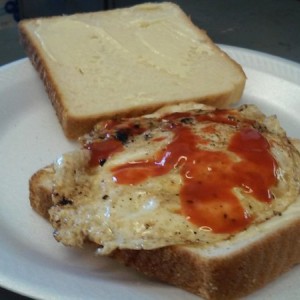 Fried egg hot sauce and mayo, just 3 more days till pay day ha