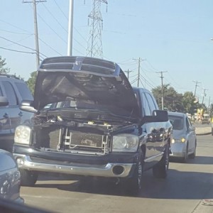 Idiot is driving down a busy road during rush hour like this, instead of pulling over.