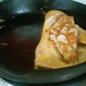 Screwed up my first flip but oh well. Left over ham and chedder