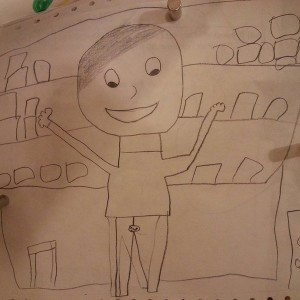 My daughter drew me a picture. Me at the reloading bench, working. It's a button...