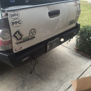 Bumper on, license plate on, rigid lights on and wired up
