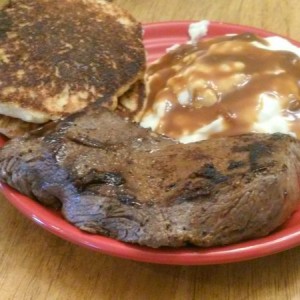Backstrap, hoe cakes and mashed potatoes and gravey (its a small plate so everything just looks huge)