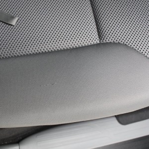Thread pull on rear passenger cover