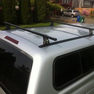 Drilled 10 holes in my canopy today and installed the tracks and Thule rack I've had in the garage forever.