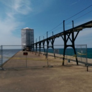 Manistee, Mi pier and lighthouse under construction.